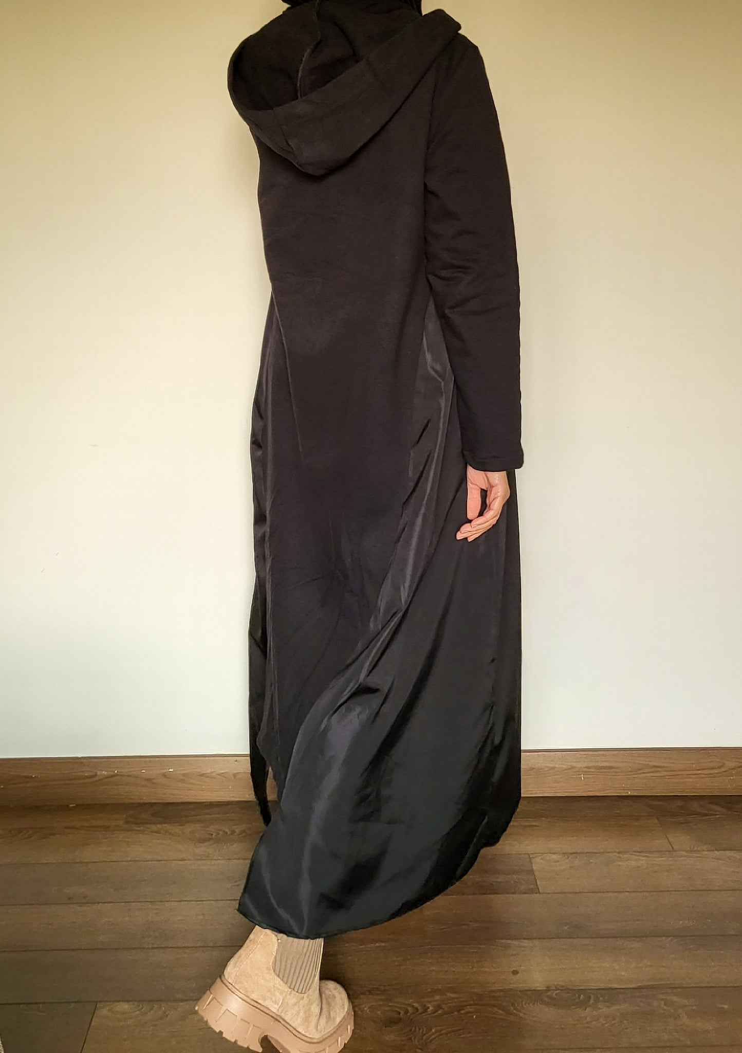 The hooded black dress